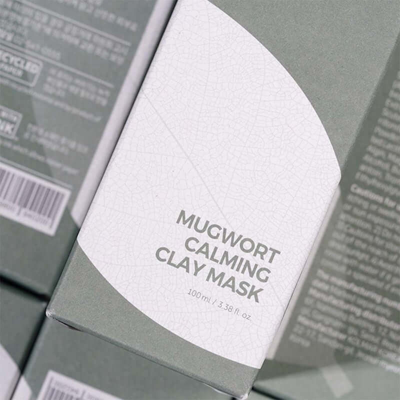 Isntree Mugwort Calming Clay Face Mask packaging, 100ml, designed for soothing all skin types and deep cleansing.