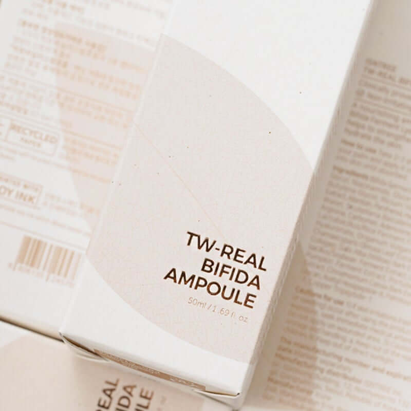 Isntree TW-Real Bifida Ampoule 50ml packaging showcasing tone and wrinkle care formula in a minimalist design.