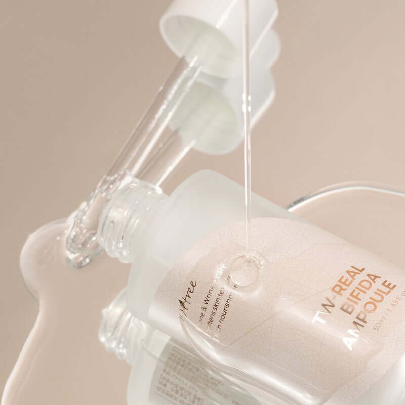 Isntree Tw-Real Bifida Facial Ampoule bottle with dropper, showcasing its clear, moisturizing formula for tone and wrinkle care.